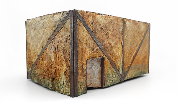 tabletop tavern terrain piece showing the back of the building and rear door